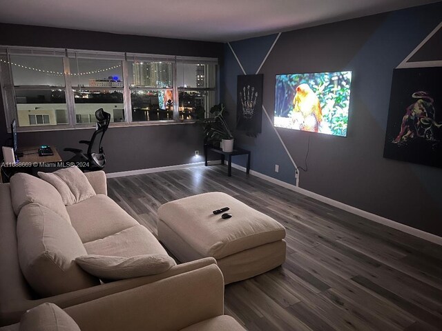 111 Golden Isles Dr Unit G5, Hallandale Beach, FL 33009 - living area featuring wood finished floors and baseboards