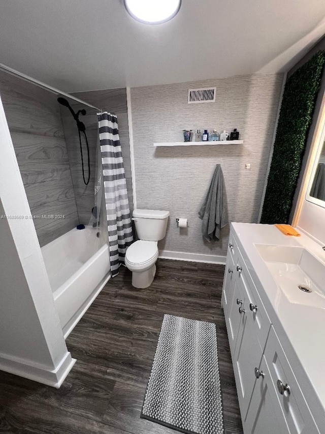 full bathroom featuring toilet, shower / bath combo, vanity, and wood-type flooring