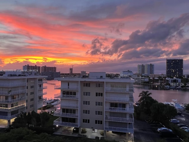 property's view of city featuring a water view