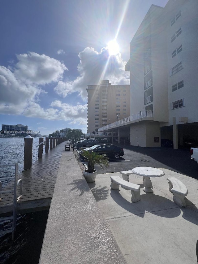 111 Golden Isles Dr Unit G5, Hallandale Beach, FL 33009 - view of home's community with a water view and uncovered parking