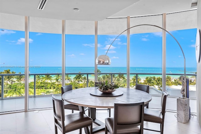 100 S Pointe Dr Unit 706, Miami Beach, FL 33139 - sunroom / solarium with a water view and plenty of natural light