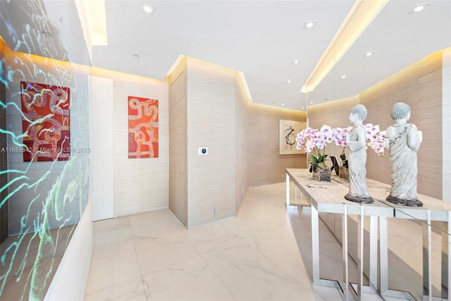 100 S Pointe Dr Unit 706, Miami Beach, FL 33139 - hall with light marble finish floors and recessed lighting