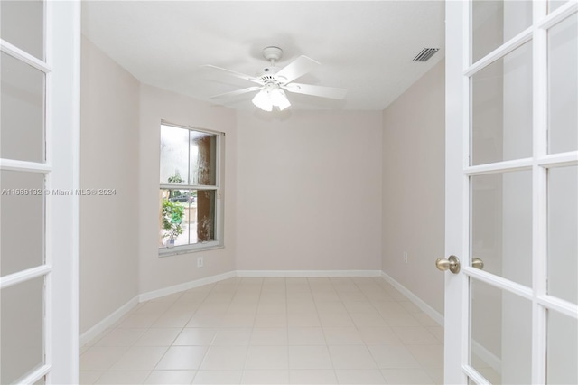 unfurnished room featuring ceiling fan