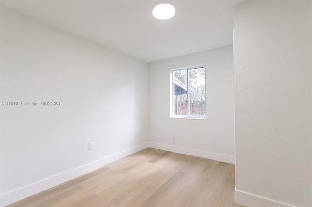 empty room with light wood-type flooring