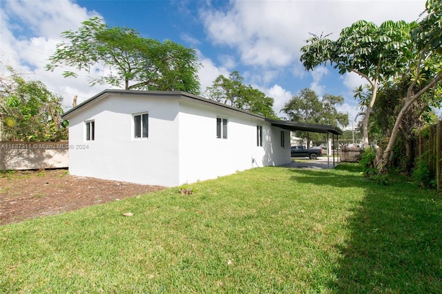 exterior space featuring a lawn and a patio