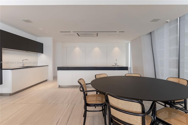 dining room featuring sink