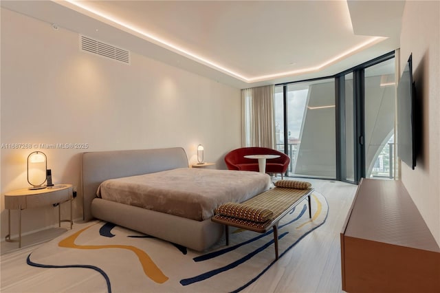 1000 Biscayne Blvd Unit 2702, Miami, FL 33132 - bedroom featuring access to outside, multiple windows, and a wall of windows