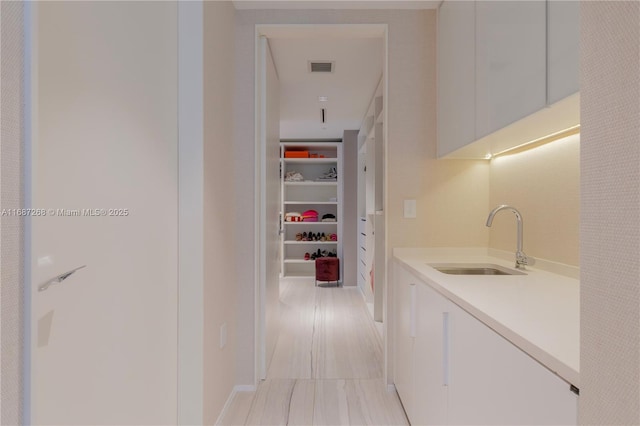 1000 Biscayne Blvd Unit 2702, Miami, FL 33132 - corridor featuring a sink