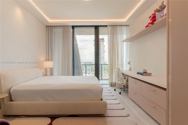 1000 Biscayne Blvd Unit 2702, Miami, FL 33132 - bedroom with built in study area and expansive windows