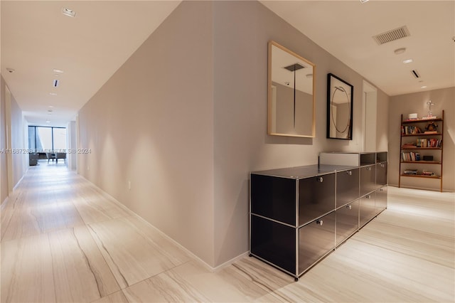 hallway featuring light hardwood / wood-style flooring