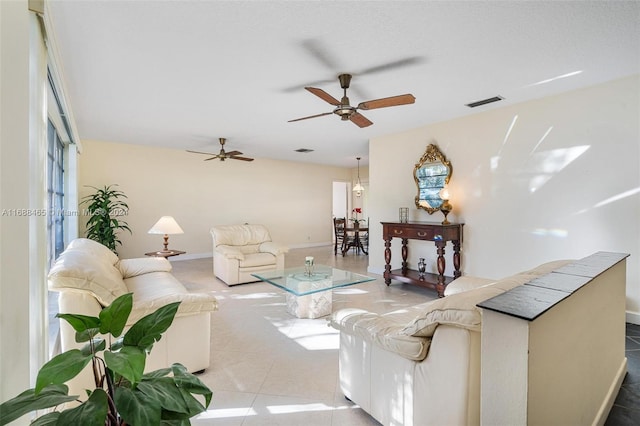 living room featuring ceiling fan