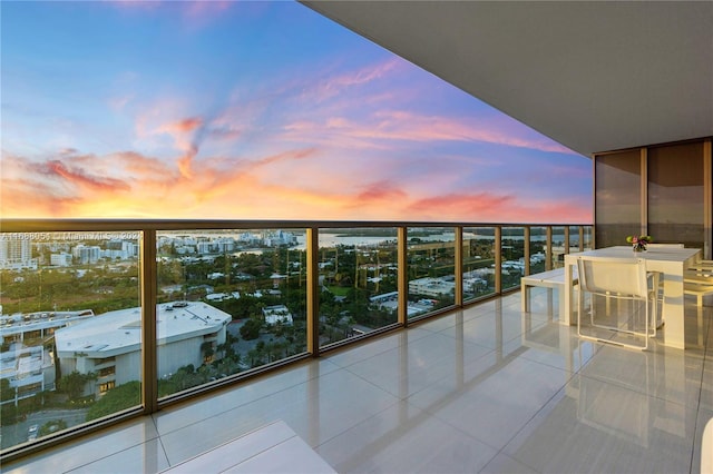 view of balcony at dusk