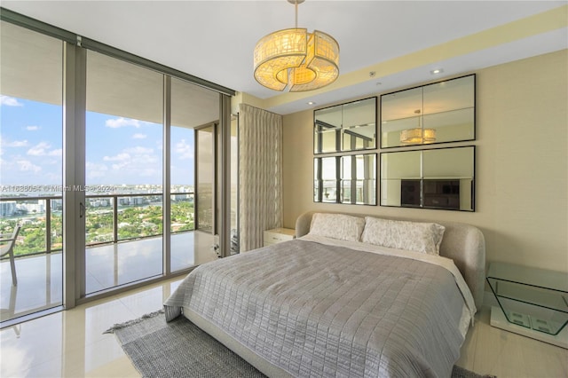 tiled bedroom featuring expansive windows, multiple windows, and access to exterior