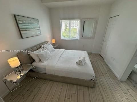 bedroom featuring light hardwood / wood-style floors