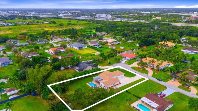 2940 SW 155th Ln, Davie, FL 33331 - aerial overview of property's location with property parcel outlined and a pool
