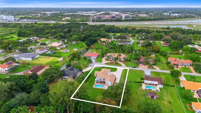 2940 SW 155th Ln, Davie, FL 33331 - aerial view of residential area with property parcel outlined and a large body of water
