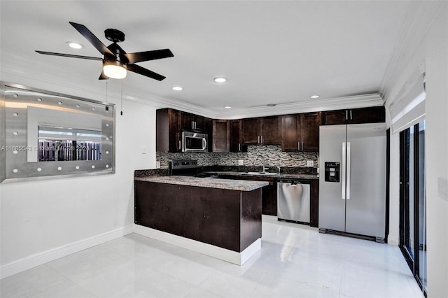 kitchen featuring backsplash, kitchen peninsula, ornamental molding, and stainless steel appliances