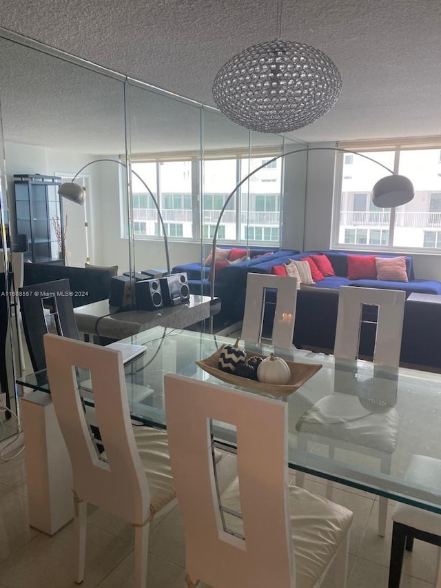 5401 Collins Ave Unit 412, Miami Beach, FL 33140 - dining space with a textured ceiling