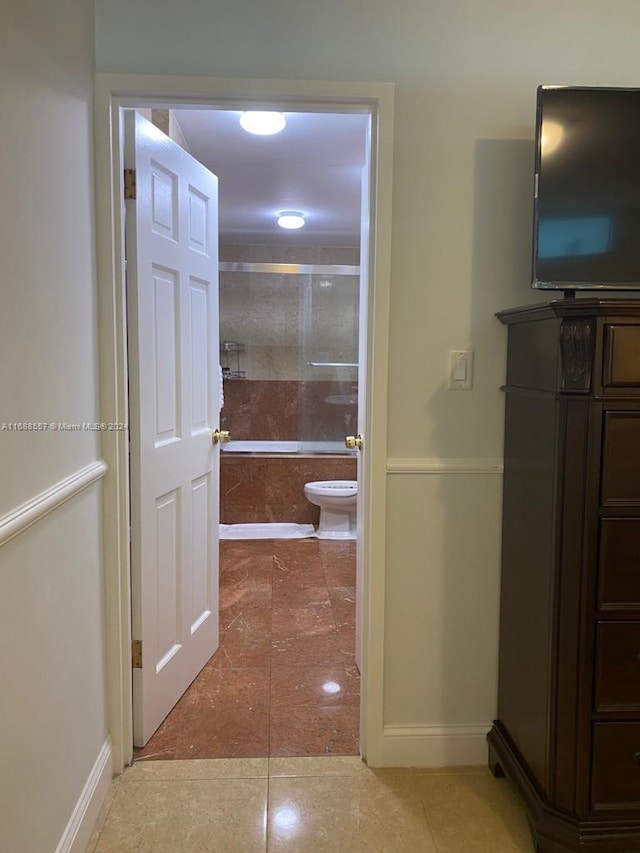 5401 Collins Ave Unit 412, Miami Beach, FL 33140 - full bathroom with shower / bath combination with glass door and baseboards
