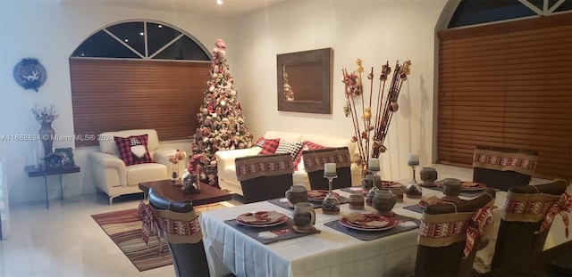 dining space with tile patterned flooring