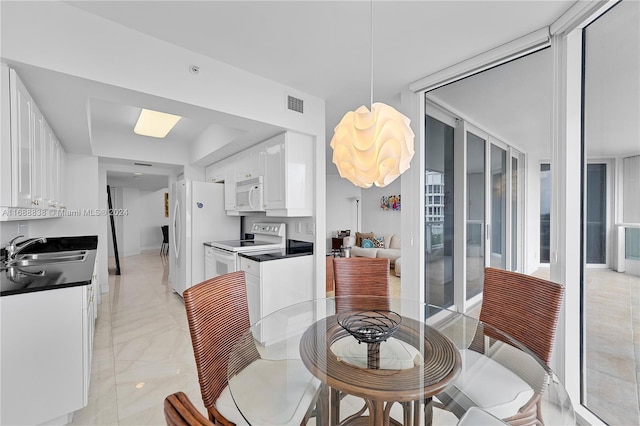 dining area featuring sink