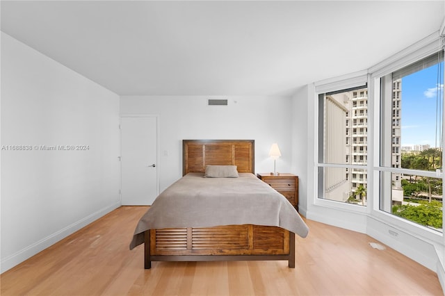 bedroom featuring light hardwood / wood-style flooring