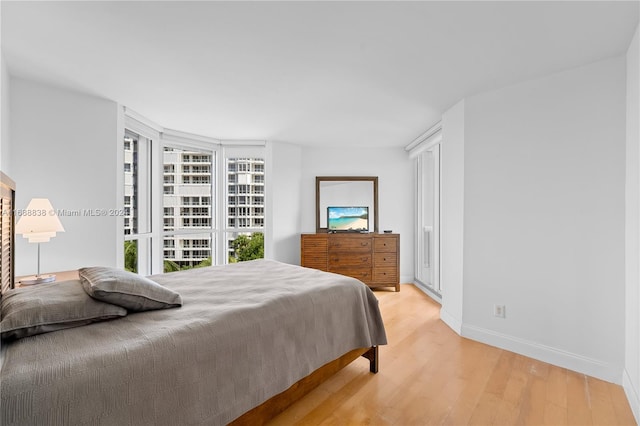 bedroom featuring light hardwood / wood-style flooring