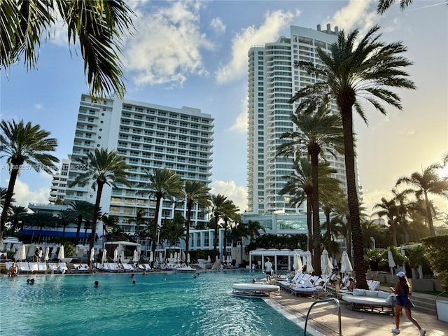 view of swimming pool with a water view