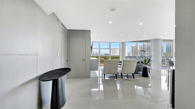 unfurnished living room with expansive windows