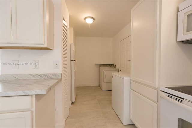 clothes washing area featuring washer / clothes dryer