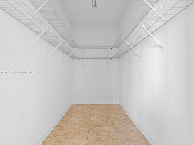 living room with light tile patterned floors