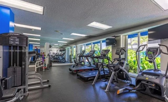 workout area with a textured ceiling