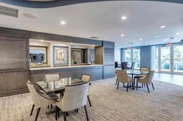 dining room featuring light hardwood / wood-style floors