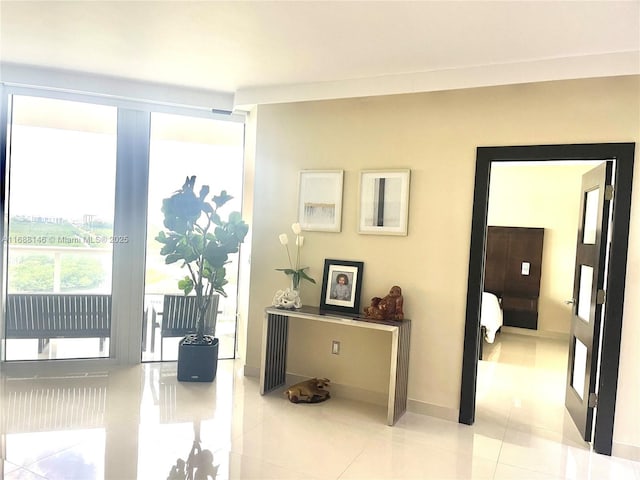 doorway to outside featuring light tile patterned floors