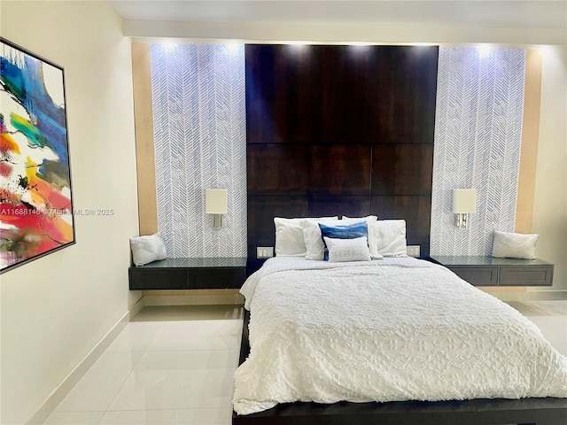 bedroom featuring light tile patterned flooring