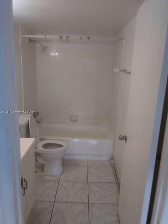 full bathroom featuring toilet, vanity, and bathing tub / shower combination