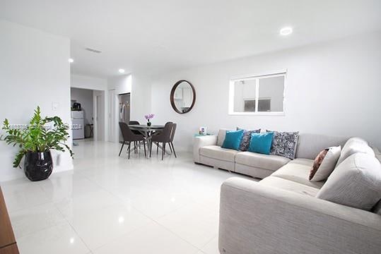 living room featuring tile patterned flooring