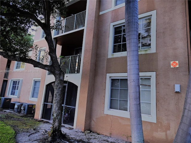 view of building exterior featuring central AC unit