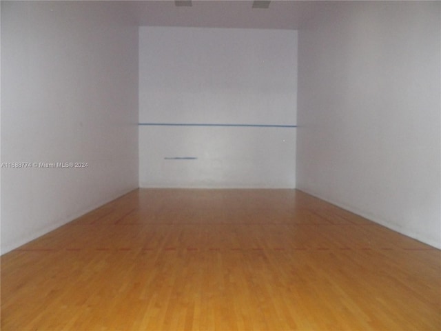 empty room featuring hardwood / wood-style flooring