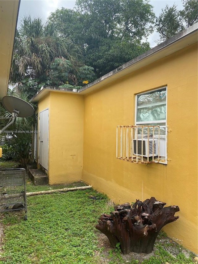 view of home's exterior featuring a lawn