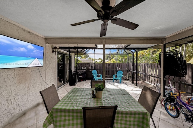 sunroom / solarium with ceiling fan