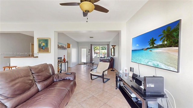 living room featuring light tile patterned floors and ceiling fan