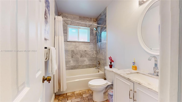 full bathroom with vanity, toilet, and shower / bath combo with shower curtain