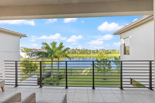 balcony featuring a water view