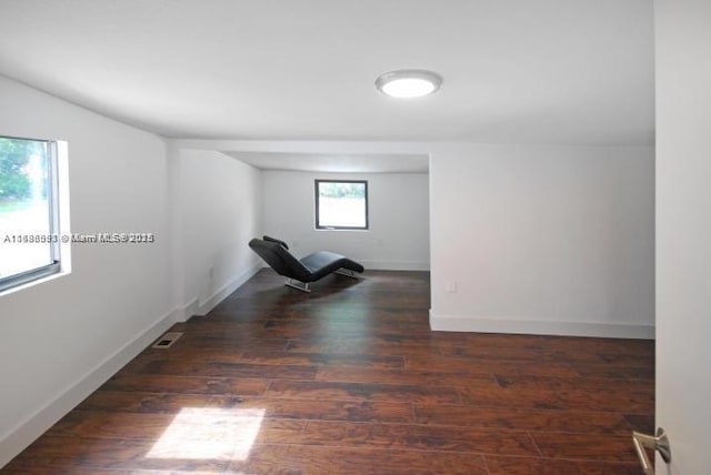 interior space with dark wood-type flooring