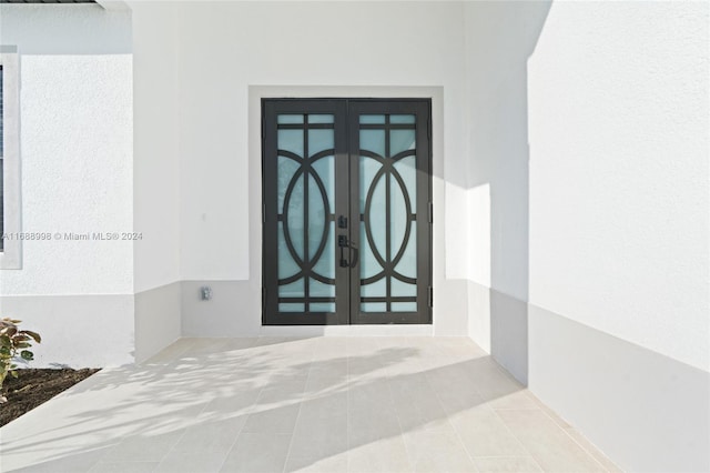 doorway to property with french doors