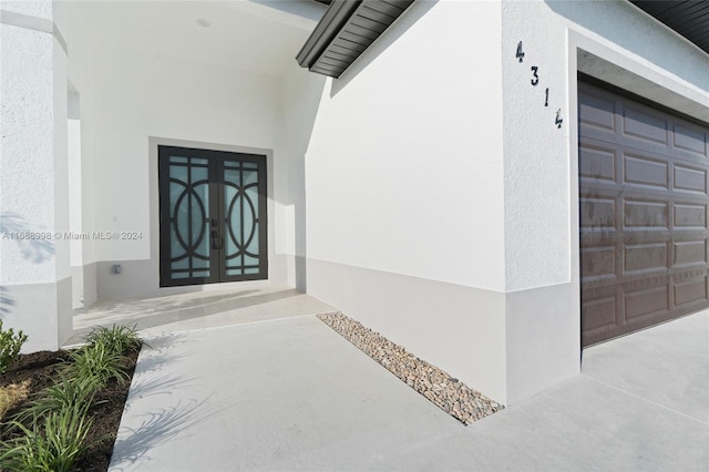 entrance to property featuring french doors