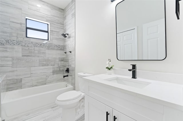 full bathroom featuring toilet, tiled shower / bath combo, vanity, and wood-type flooring