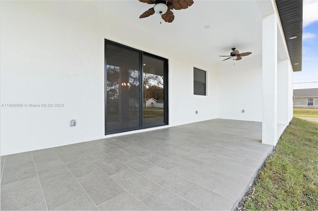 view of patio featuring ceiling fan