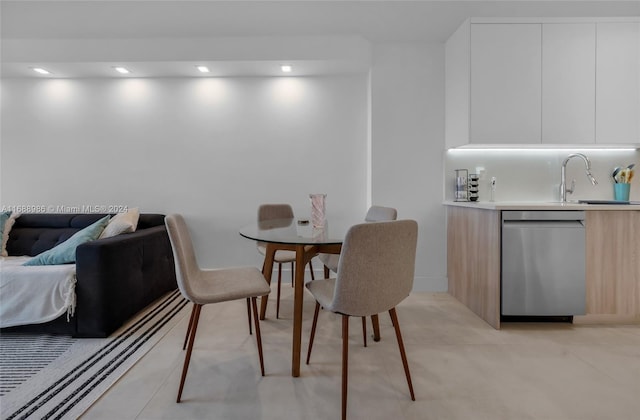 dining area featuring sink